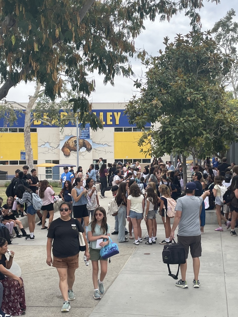 students and families walking at our get the scoop event