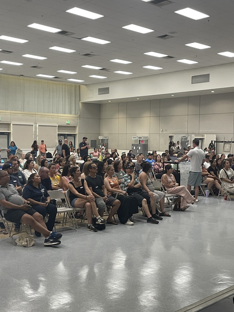 families listening to a presentation in the mpr