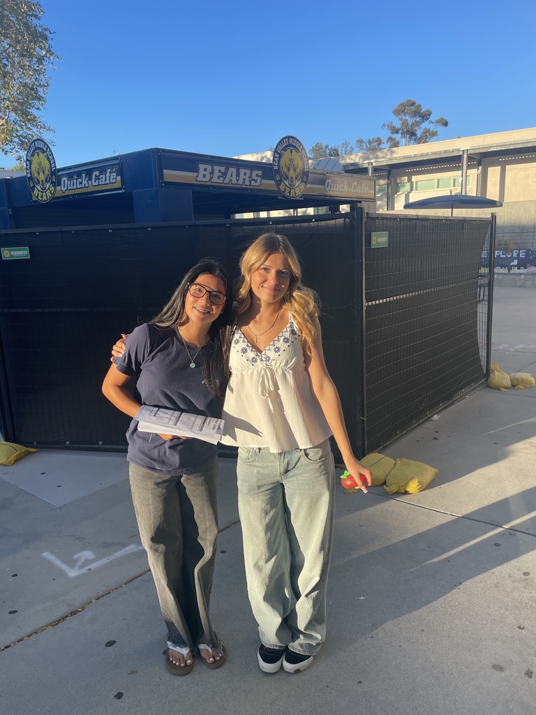 two students helping at BTSN