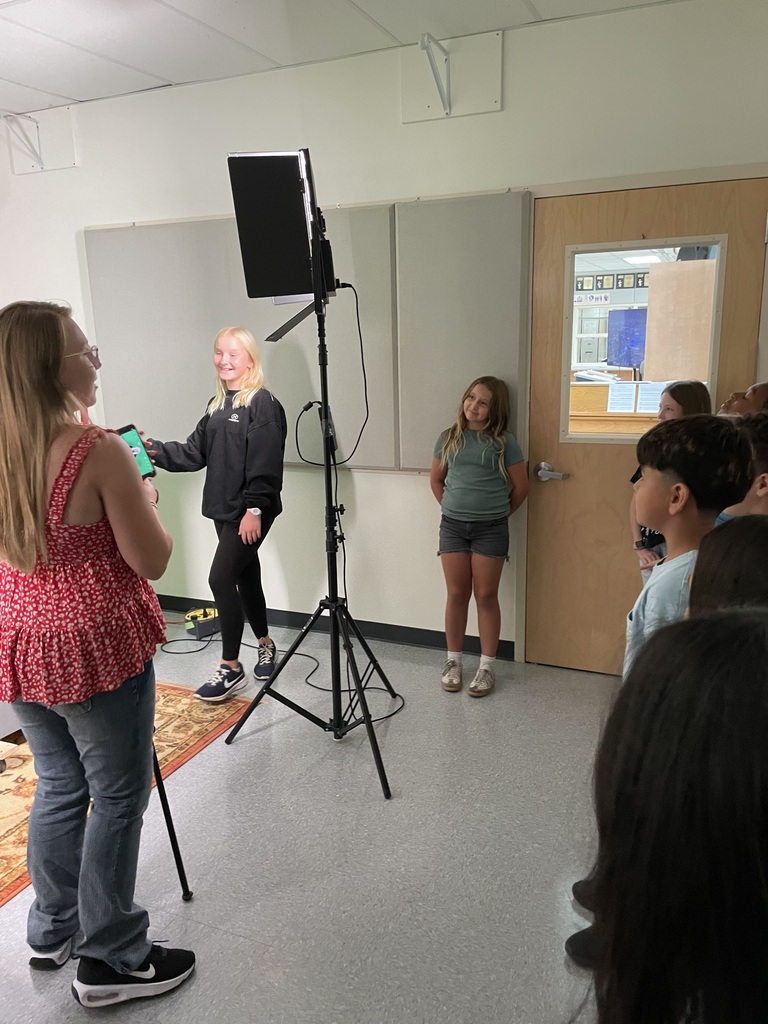 students observing other students doing the borad cast in studio