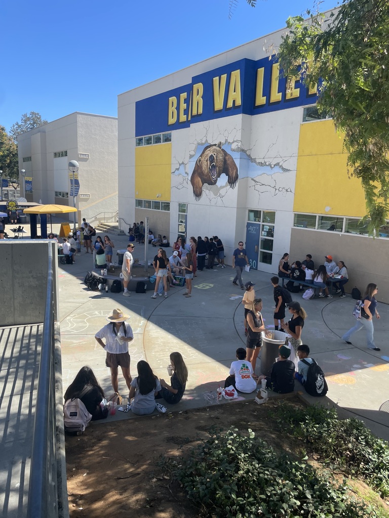 Parents and students eating in lower quad area