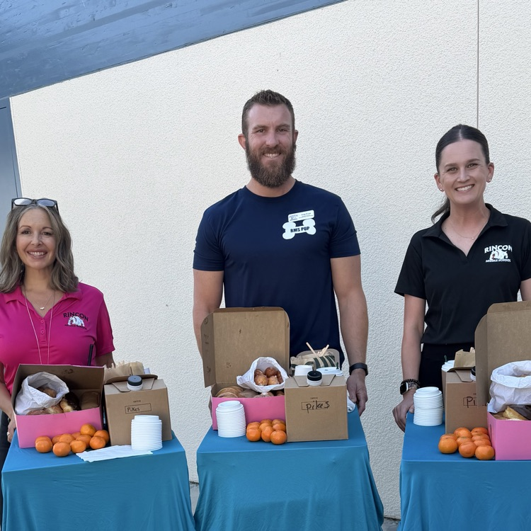 admin team serving coffee and donuts 