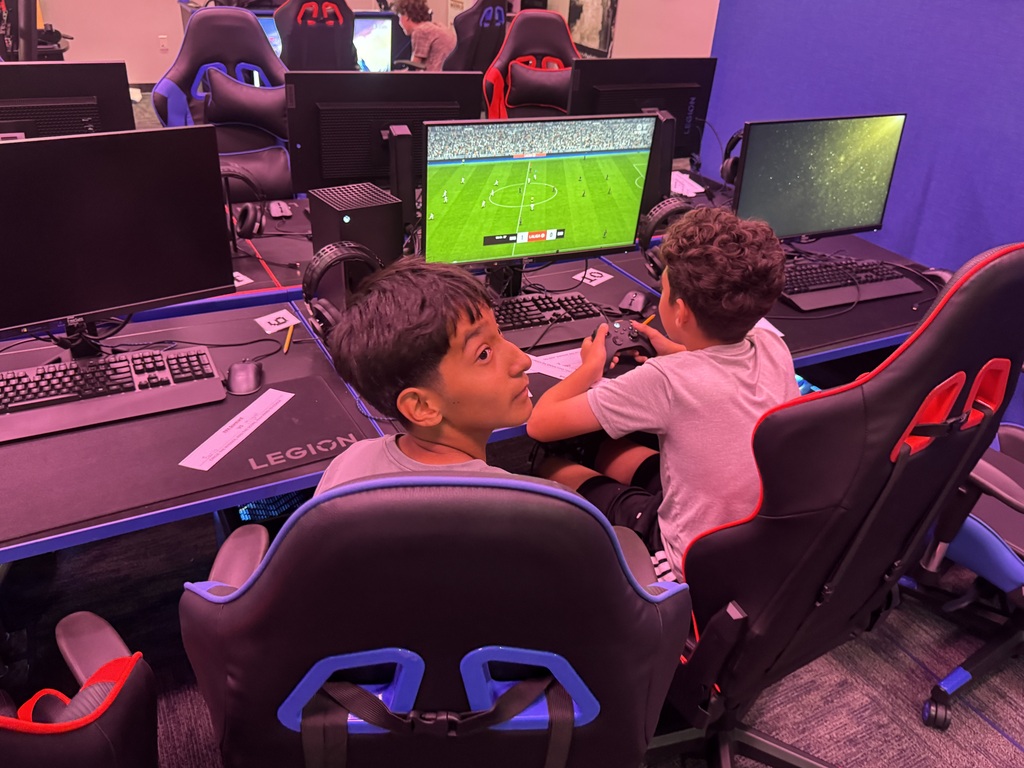 Students playing FIFA