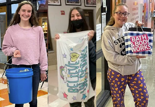 Three people using unconventional items instead of backpacks: a blue bucket, a colorful pillowcase, and a Bath & Body Works shopping bag.
