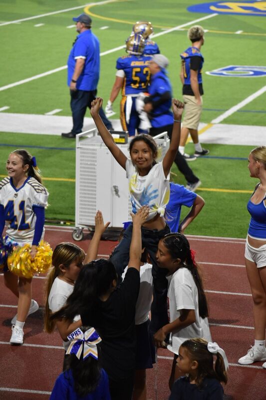 The Felicita Cheer Team performs.