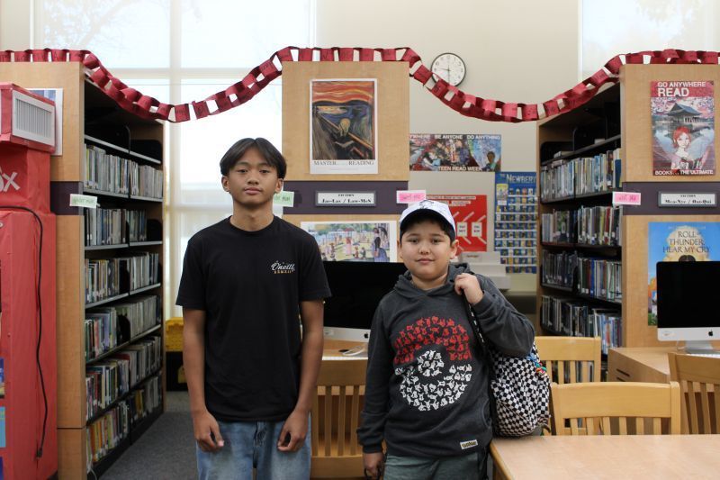 Bear Valley Middle School students, Champion Russell Paner and Runner-up, Van Mason  pose.