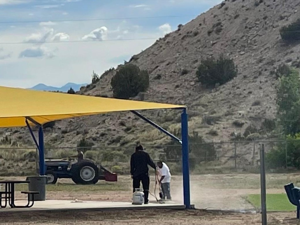 EPS Maintenance Staff Cleaning the Playground