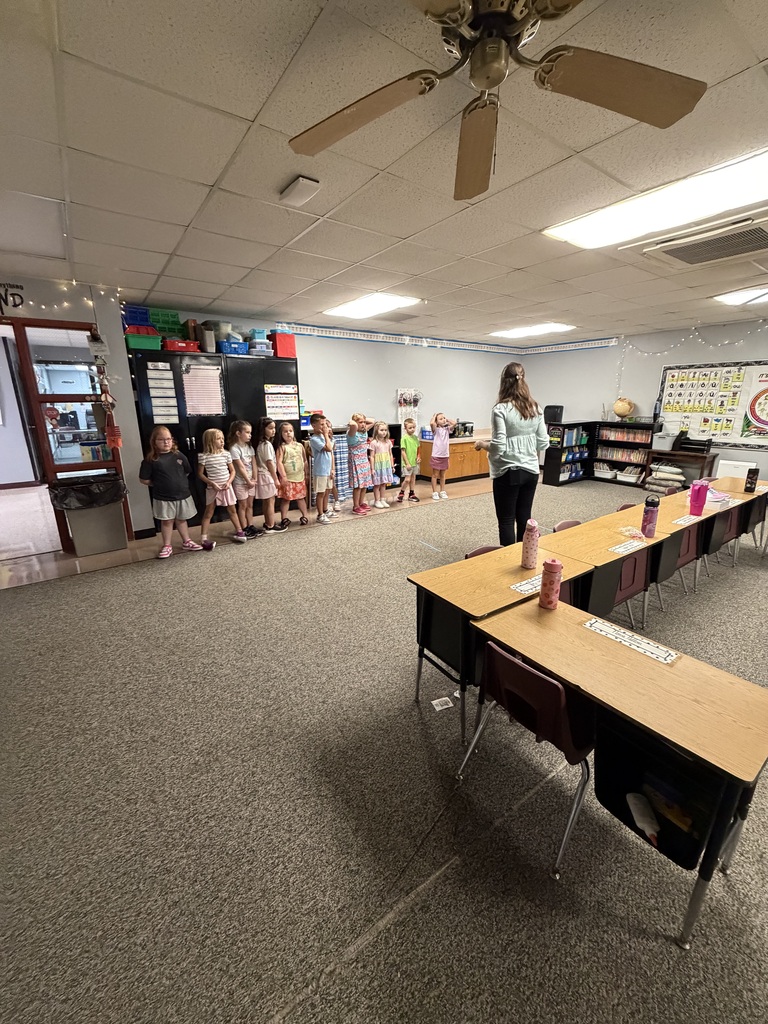 Students standing in a line for team building activity
