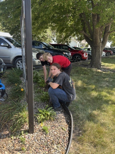 Students doing garden work at school