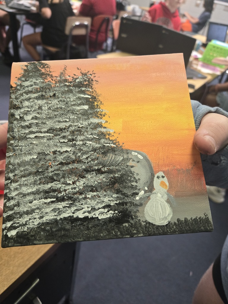 A piece of artwork painted by a student of a snowman with trees in the sunset