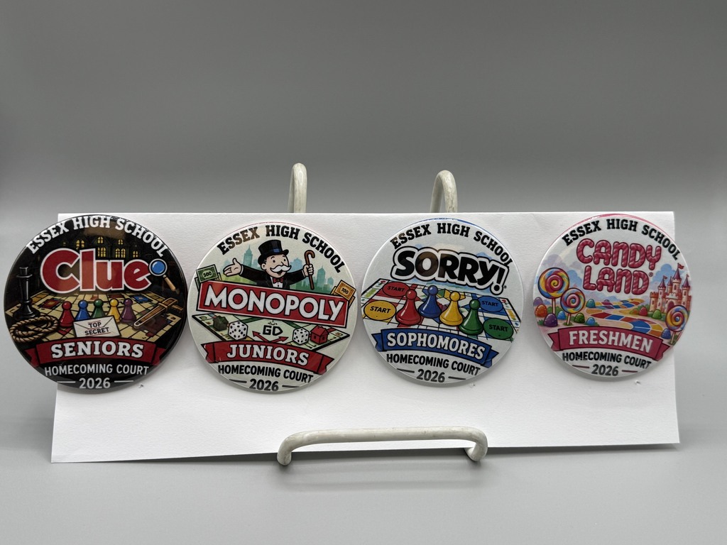 Four buttons that have different board game themed designs for each grade
