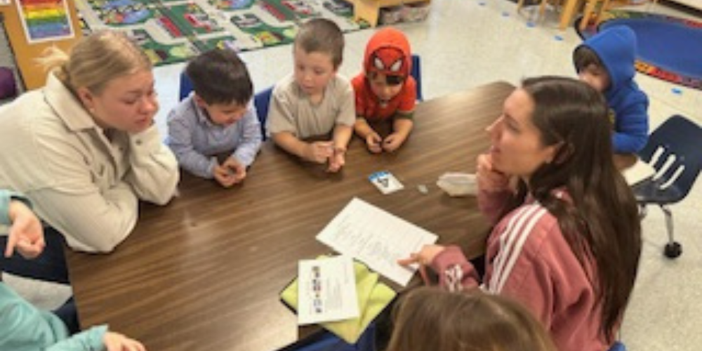 Students sitting around a table