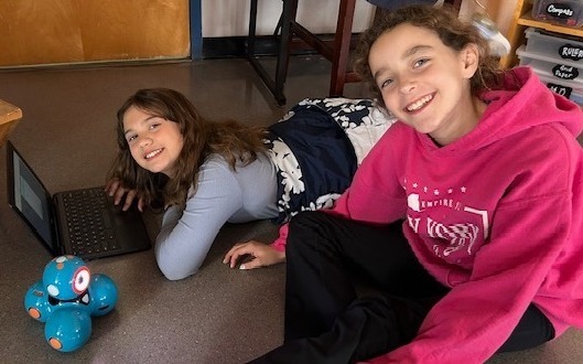 Students working with robots