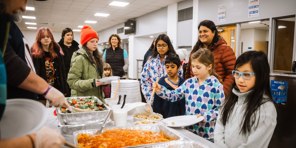 Students and families in line for food