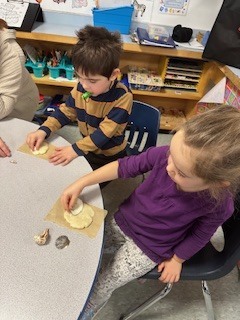 Students working with their hands
