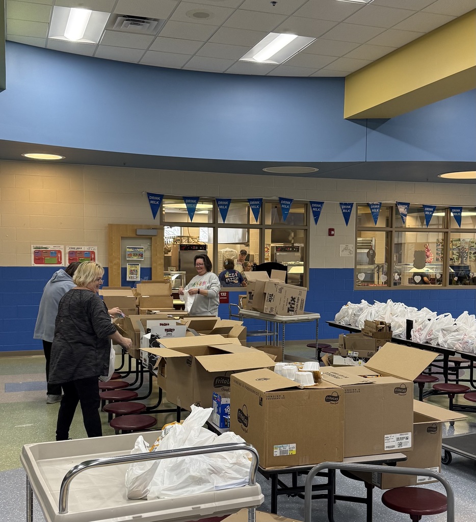 West  Irvine Staff working hard to pack food for their students!