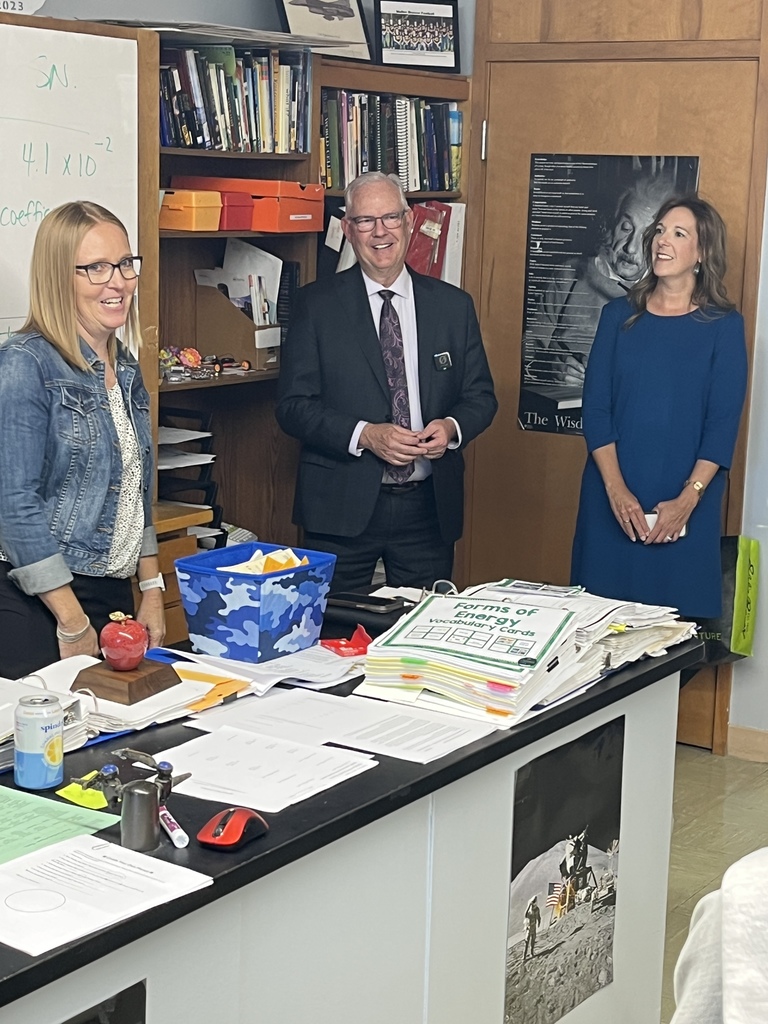 Sarah Hardin, NE Teacher of the Year, with Commissioner Dr. Brian Maher and Board of Education President Elizabeth Tegtmeier.