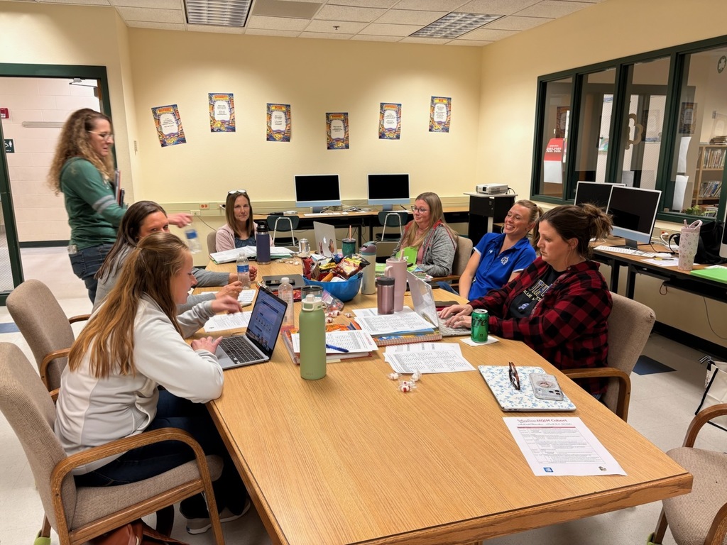 Teachers talking together