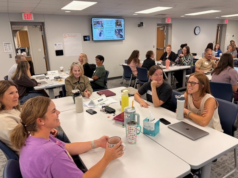 Teachers talking together