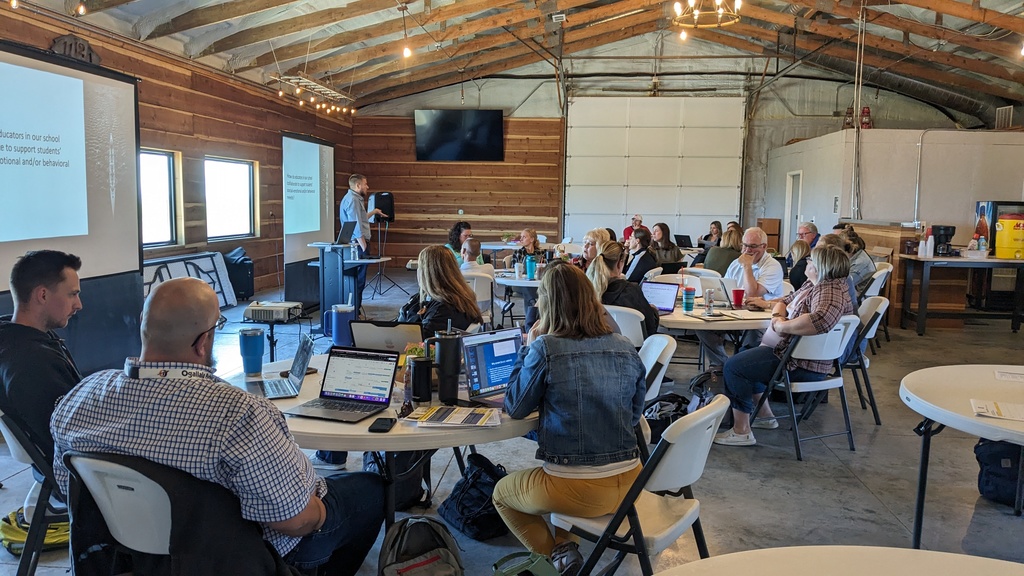 School teams listen and learn from educator and consultant Ricky Robertson.