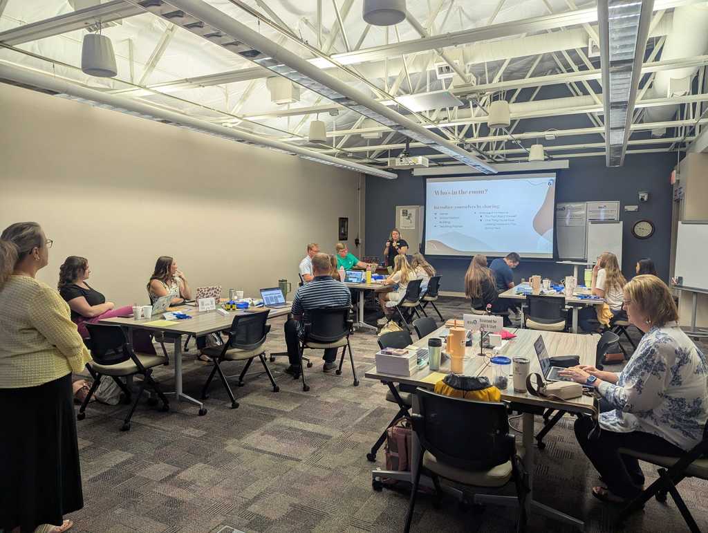 New teachers in conference room