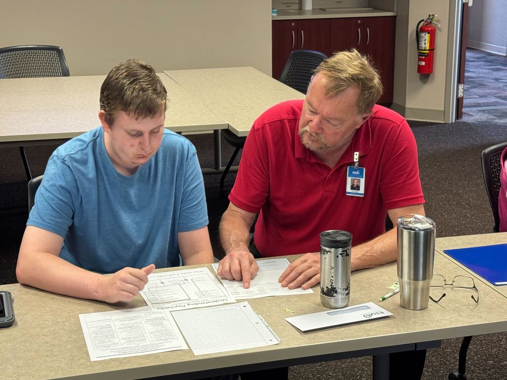 Dan Ziegler working with student