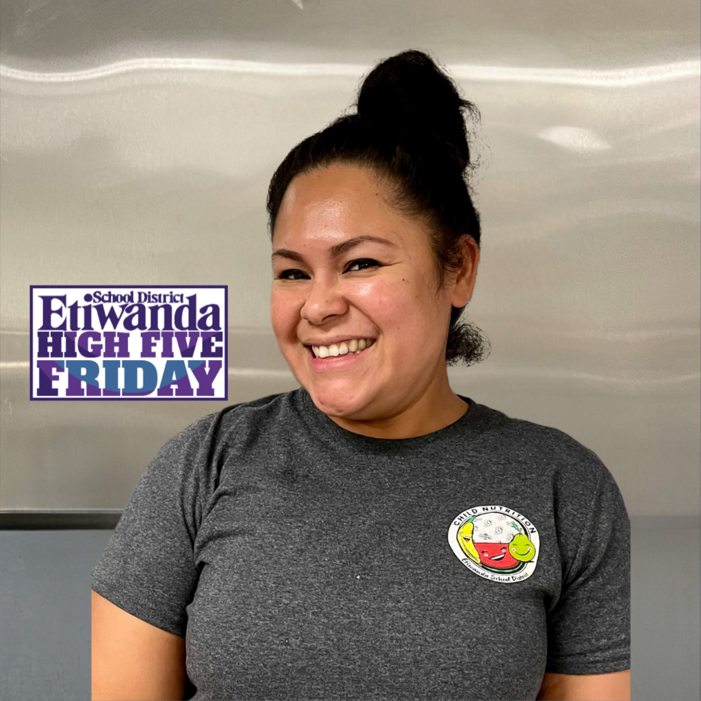 Text: High Five Friday Image: smiling woman wearing a gray shirt