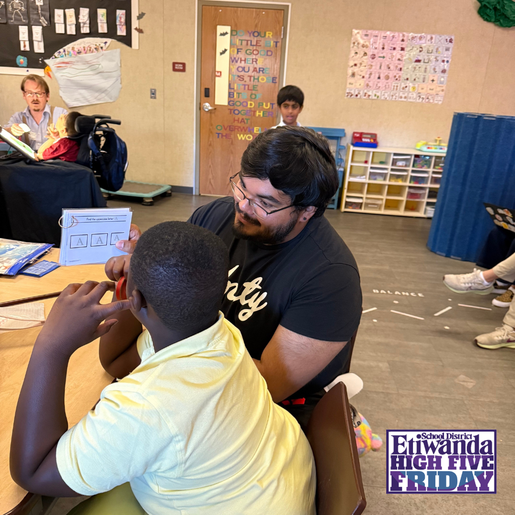 Text: Etiwanda School District, High Five Friday Image: Teacher working with a student