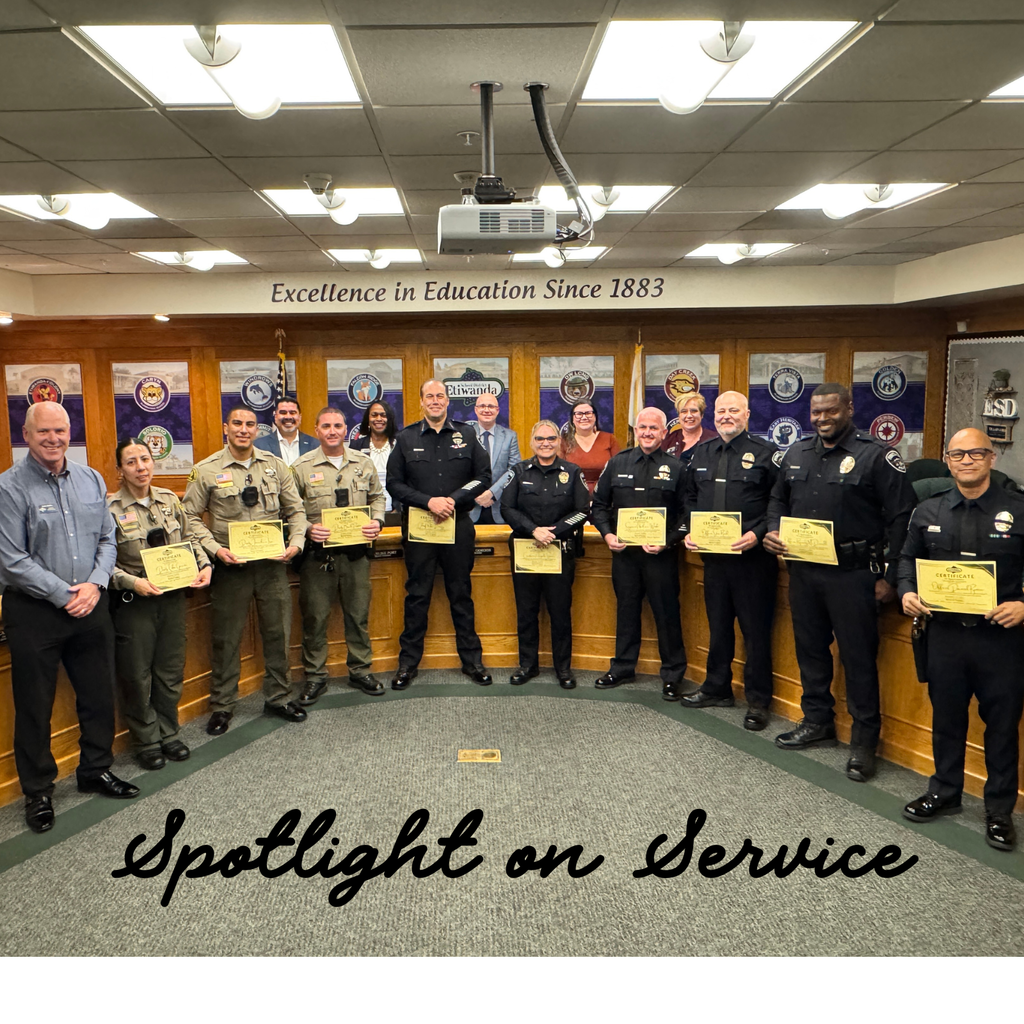 Text: Spotlight on Service Police officers and board members smiling