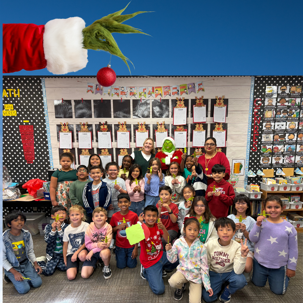 No text Image: students smiling with the Grinch