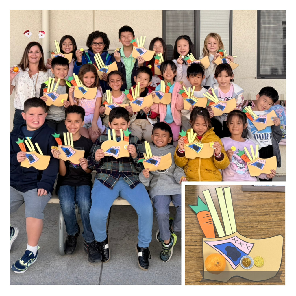 No Text Image: students holding up shoes smiling