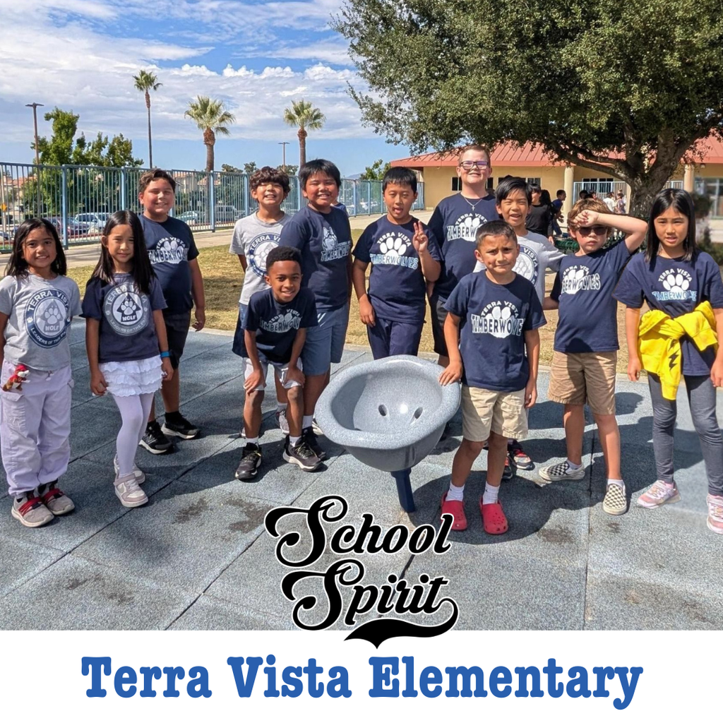 Text: School Spirit Terra Vista Elementary Image: a group of students wearing blue TV Spirit shirts