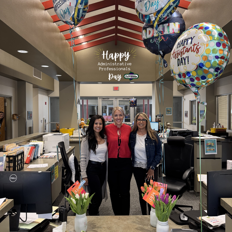 Text: Happy Administrative Professionals Day 2024 - Etiwanda Logo, three smiling females in an office