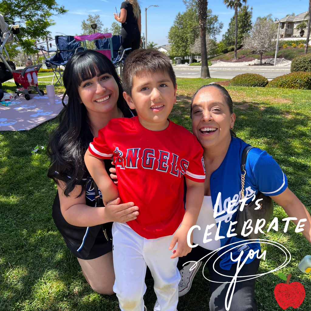 Text: Let's celebrate you! Image: smiling women and child