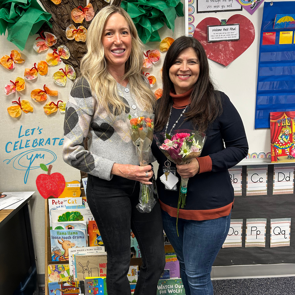 Text: Let's Celebrate you Image: two smiling adults with flowers. both female