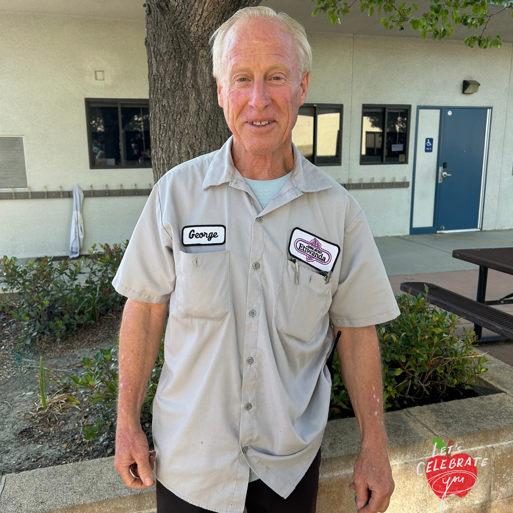 Text: Let's Celebrate you Image: smiling man in a grey shirt