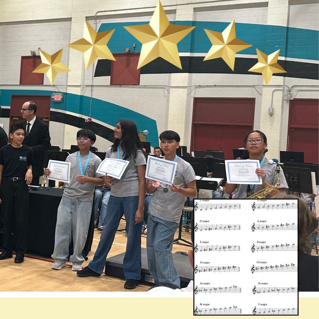 No text Image: 4 students smiling holding up a certificate.