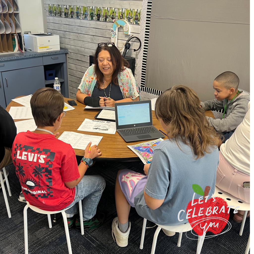 Text: Let's celebrate you Image: adult female sitting at a table with three students 