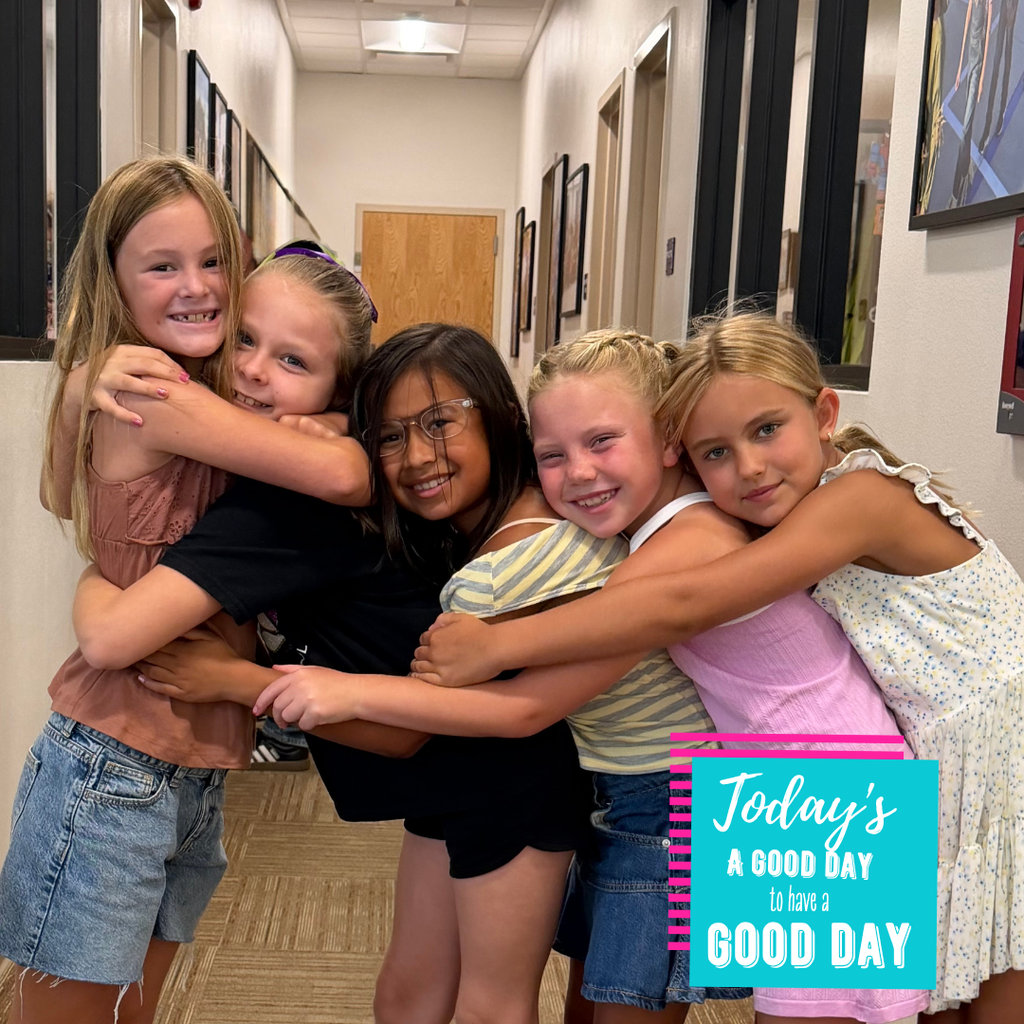 Text: Today's a good day to have a good day Image: 5 smiling girls in an office