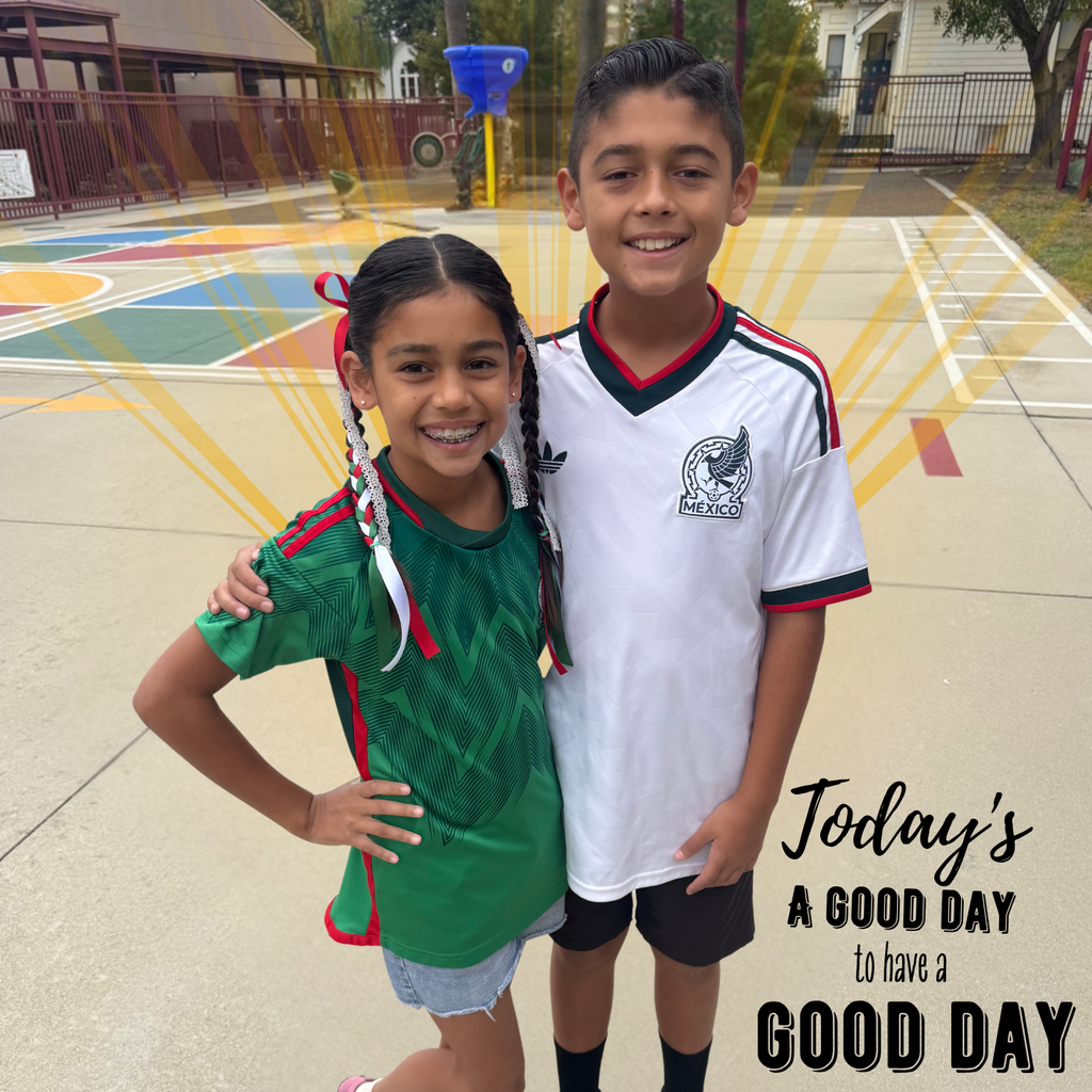 Text: today's a good day to have a good day. Image of two smiling students