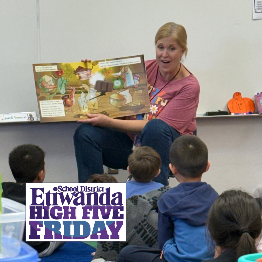 Text: Etiwanda School District, High Five Friday Image: female reading a book to a class