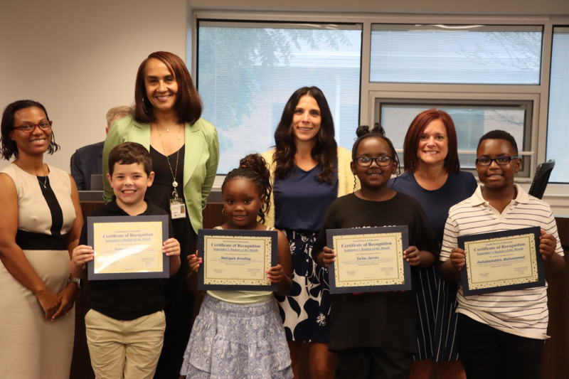 Four Chardon Hills Students with Board President Gabrielle Kelly, Superintendent Karen Brown, Chardon HIlls Principal Deana Stinchcomb and Asst. Principal Jamie Mediate
