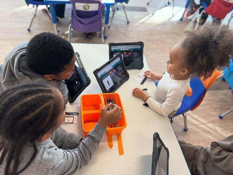 Students practicing on iPads