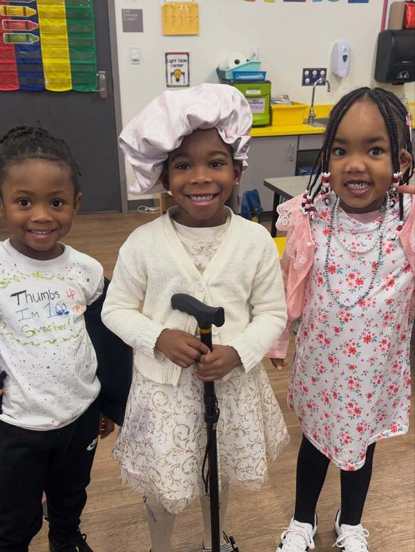 Three ELV students dressed up for 100th Day Celebration