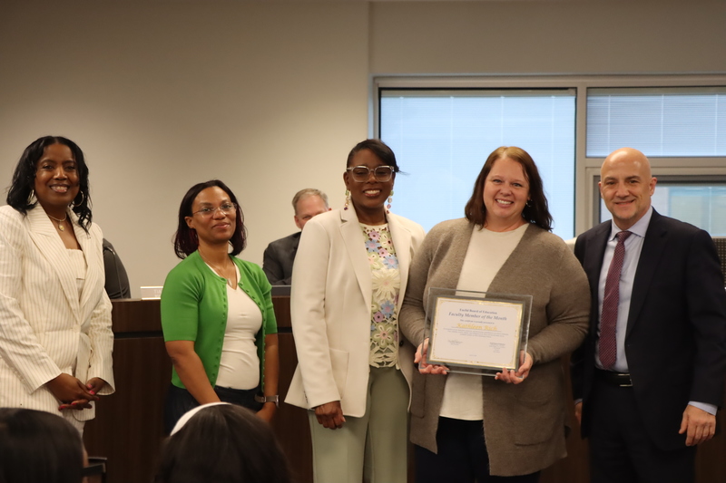 Kathleen Rich, posing with certificates alongside Chris Papouras, Gabrielle Kelly, LaWanda Prettyman and Velma Bell-Clark.