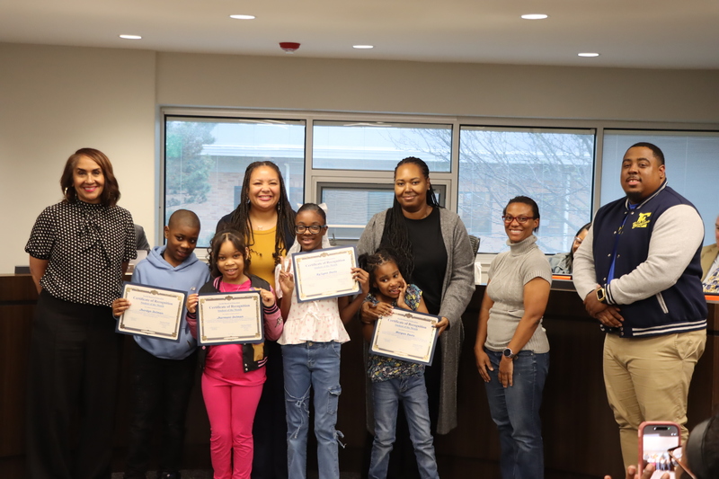 Bluestone Students of the month, posing with certificates alongside Karen Brown, Gabrielle Kelly, Cherree Mason and  Mario Snowden.