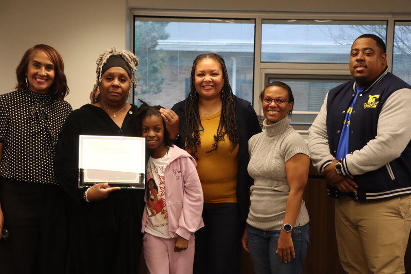 Ms. Valentine and Justice McCray posing with certificates alongside Karen Brown, Gabrielle Kelly, Cherree Mason and  Mario Snowden.