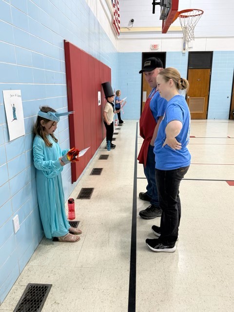 The Statue of Liberty, Lincoln Memorial, and The American Flag