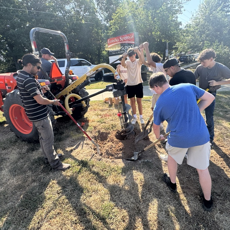 students digging