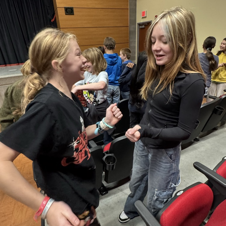 red ribbon presenter